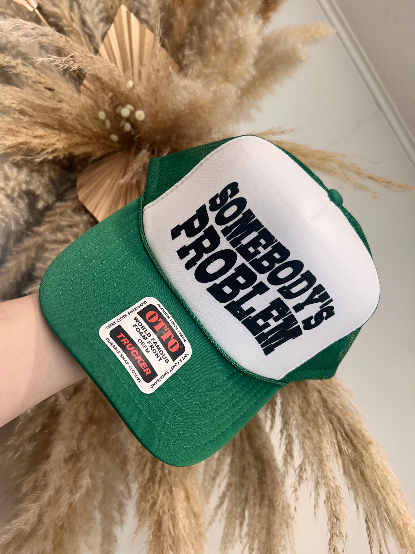 Somebody’s Problem Trucker Hat